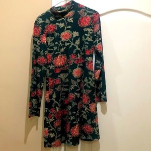 Green, cream, and red floral print dress.